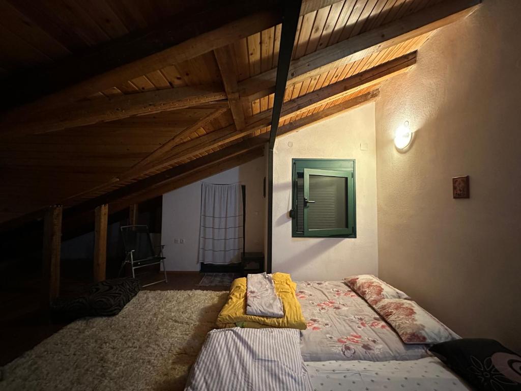Image of three beds in the attic