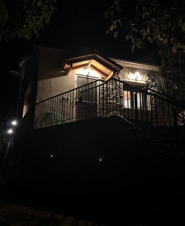 Image of a house shining at night